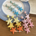 Woven Starfish Drop Earrings With Polished Metal Tone Details view 2