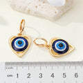 Heart Evil Eye Huggie Drop Earrings in Gold and Silver Tone view 4