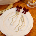 Burgundy Velvet Bow Drop Earrings Rhinestone Pearl Tassels view 3