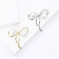 Delicate Wire Bow Brooch With Two Elongated Pearl Loops view 1