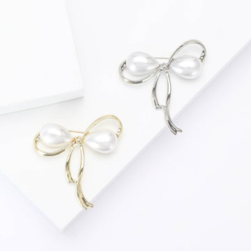 Delicate Wire Bow Brooch With Two Elongated Pearl Loops