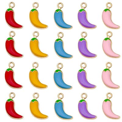 Colorful chili pepper charms arranged on a light background