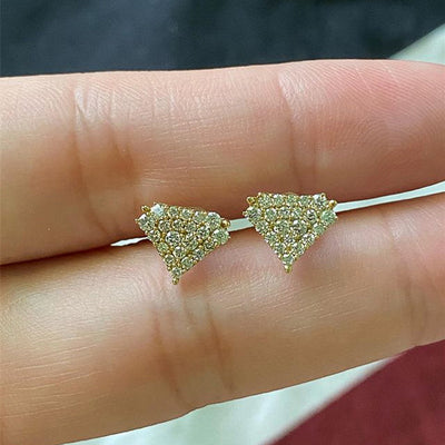 Front view of pavé triangle stud earrings in three metal tones with clear crystal details