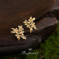 Gold Tone Clear Stone Osmanthus Flower Earrings In Clip And Stud Styles view 1