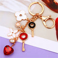 Key Flower Butterfly and Heart Clover Charm Keychains with Wrist Loops view 8