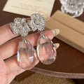 Clear Flower and Teardrop Silver Tone Statement Earrings view 3