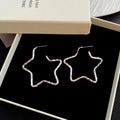 Silver Tone Hammered Outline Five Point Star Hoop Earrings view 2