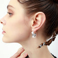 Silver Tone Angular Folded Hoop Earrings with Polished Metal Finish view 3