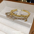 Silver Crystal Leaf Cuff And Textured Gold Or Silver Open Bangles view 3
