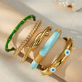 Bamboo and Geometric Bangle Collection in Mixed Metal Tones view 4