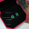 Silver Tone Emerald Green Oval Stone Clear Halo Stud Earrings view 2