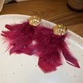 Feather Statement Earrings With Round Textured Studs view 7
