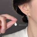 Asymmetric Silver Bow Shell Drop Earrings Mismatched Pair view 2