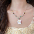White Daisy Pendant Necklace with Green and Brown Beads view 1