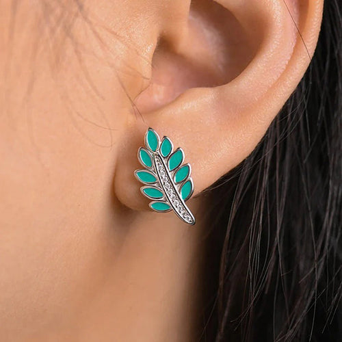 Alternate close view of the silver tone earrings