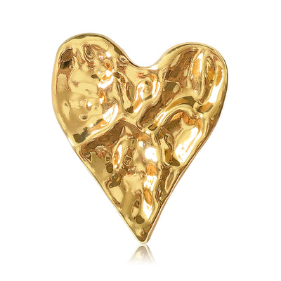 Front product view of the asymmetrical heart with a reflective hammered surface brooch