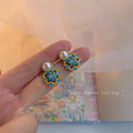 Pearl Stud Earrings With Blue And Gold Floral Enamel view 3
