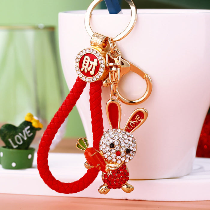 Jeweled Rabbit Holding a Carrot Keychains in Three Pictured Colors