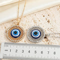 Large Round Crystal Halo Blue Evil Eye Pendant Necklaces in Two Finishes view 4