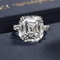 Oversized Square Step-Cut Three-Stone Ring In Polished Silver Tone view 1