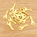 Mini Key Shaped Metal Charms in Four Finish Options view 4