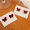 Red Flocked Bow and Butterfly Statement Stud Earrings view 1