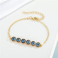 Gold Tone Multi Link Evil Eye Chain Bracelet with Six Round Charms view 2