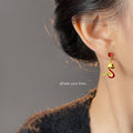Gold-Tone Red Crystal Stud Snake Charm Drop Earrings view 2