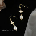 Gold Tone Eight Point Star And White Pearl Hook Earrings view 4