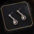 Silver Crystal Teardrop Drop Stud Earrings Pave Halo view 3