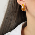 Amber Resin Teardrop Stud Earrings Glossy Curved Shape view 3