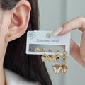 Gold Tone Three Pair Butterfly Stud and Dangle Hoop Earring Set view 4
