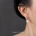 White Pearl Drop Stud Earrings Silver Tone Metal Ball Accents view 2