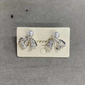 Bow Stud Earrings with Clear Crystals and Pearl Like Tops view 7