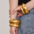 Mirror Polished Dome Bangle Gold Steel Multiple Widths view 4