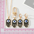 Gold Tone Black Enamel Hamsa Eye Jewelry and Keychain Options view 2