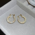 Crystal Pave U Shaped Hoop Earrings in Gold and Silver view 8