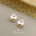 White Enamel Flower Stud Earrings Gold Leaf Accent Pair view 6