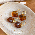 Amber Brown Resin Drop Hoop Earrings in Two Rounded Shapes view 3