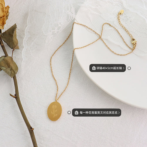 Gold rose oval pendant necklace with length and reverse-text labels