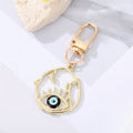 Gold Tone Irregular Openwork and Lash Evil Eye Clip Keychains view 8