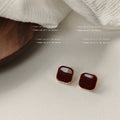 Gold Tone Rounded Square Stud Earrings In White And Burgundy view 7