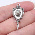 Skull Hand Mirror Charms in Silver and Red Enamel Styles view 1
