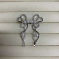 Crystal Ribbon Bow Silver Tone Dangle Clip On Earrings view 2