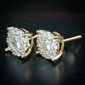 Oval Clear Solitaire Halo Stud Earrings In Polished Gold Tone view 2