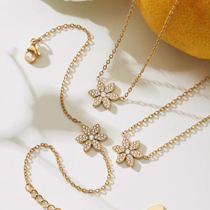 Crystal Flower Necklace and Bracelet Collection in Two Metal Tones