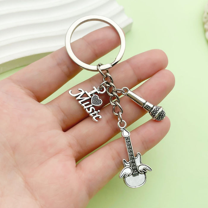Guitar, Microphone and Saxophone Charm Keychains Featuring Red Guitar Across 11 Variations