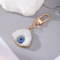 White Irregular Evil Eye Resin Keychain and Pendant Necklace view 3