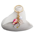 Pink Butterfly White Flower and Pearl-Look Wreath Keychain view 5