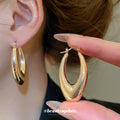 Double Teardrop Hoop Earrings in Gold and Silver Tone view 4